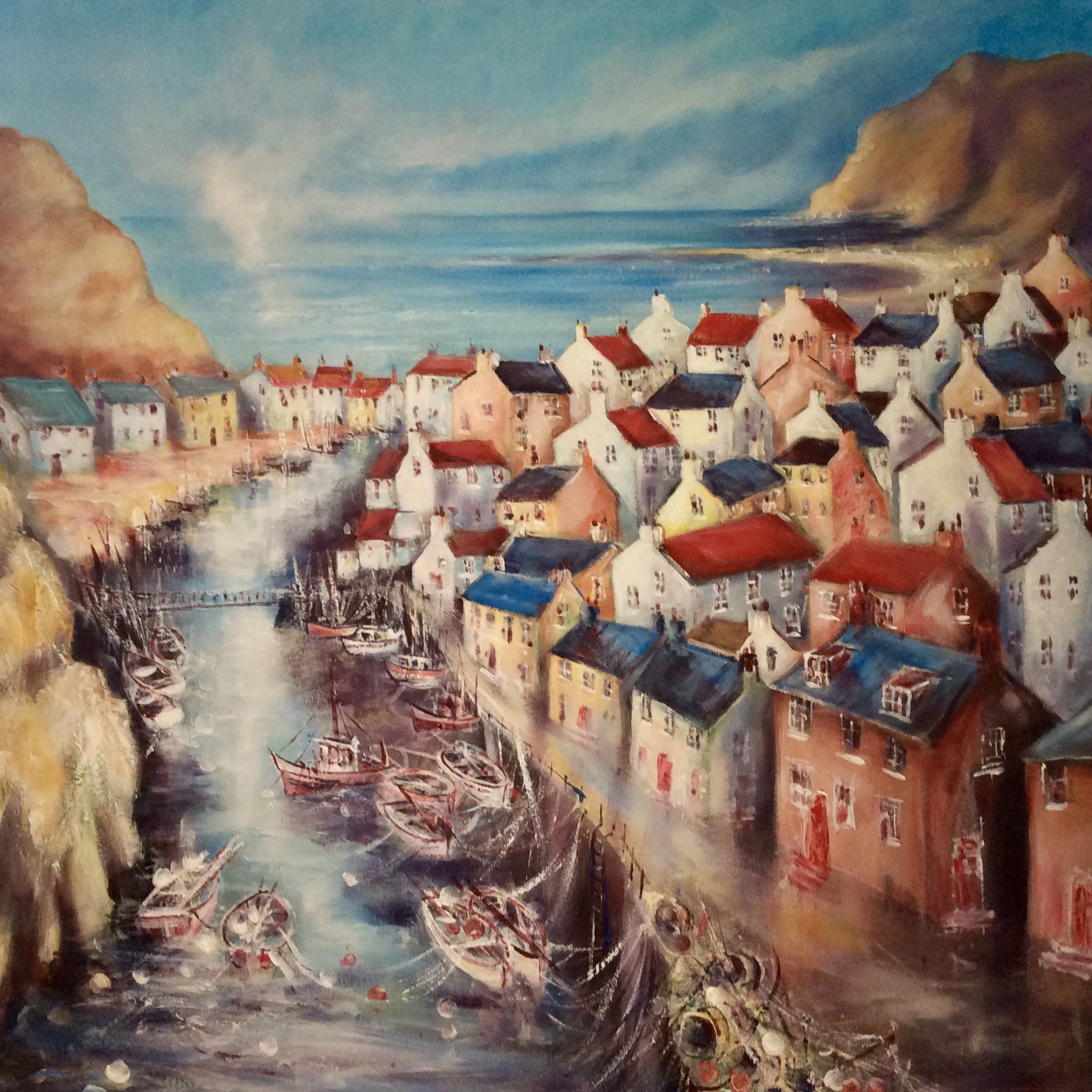A colourful scene of houses in staithes, whitby